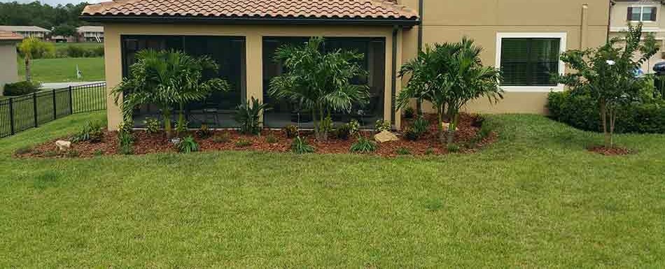 Home in Lakeland, FL using our lawn and landscape maintenance services.