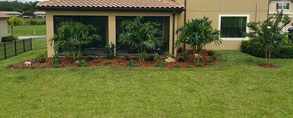 Home in Lakeland, FL using our lawn and landscape maintenance services.